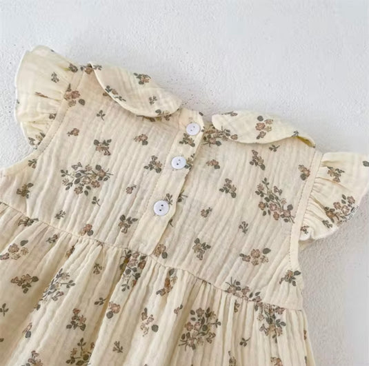 Barboteuse bébé fille fleurie en coton nid d’abeille
